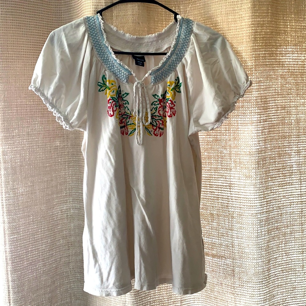 White cotton blouse with floral pattern